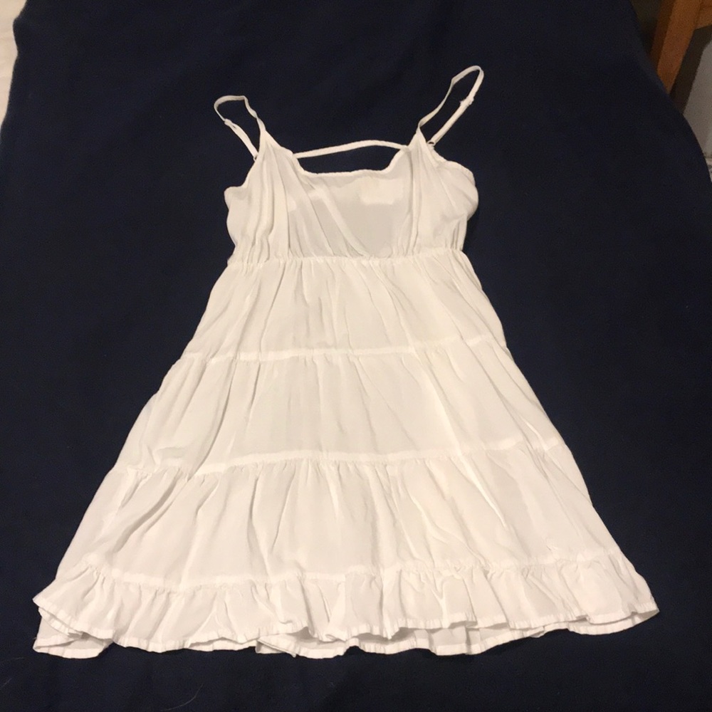 White ruffled dress with cute back